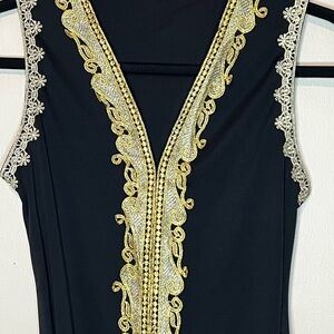 Elegant Black Dress with Gold Embellishments